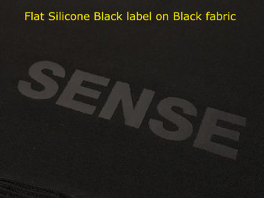 Black Silicone Label on Black fabric